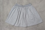 spódniczka z elastyczną gumką z Pepco szara w r. 146/152