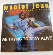 Wyclef Jean Featuring Refugee Allstars - We Trying To Stay Alive