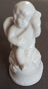 Dzwonek ceramiczny - Figurka aniołka z instrumentem 