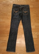 Ciemnogranatowe klasyczne jeansy dzwony Promod 38