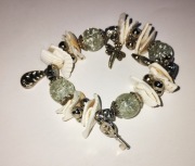 Bransoletka metalowa / tworzywo na gumce - motyw morski