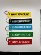 Breloczki w kształcie butelek słynnego napoju Prime