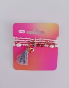 zestaw czterech białych bransoletek z koralików marki Eloy