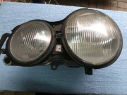 MERCEDES W210 E klasa Reflektor Lewy Org. Bosch