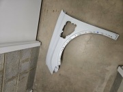 RENAULT V 5 E-TECH 2024- błotnik lewy przód oryginał.  