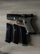 Replika pistoletu Glock 17 APS Scorpion asg blowback tokio marui green gas