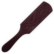 Packa BDSM wykonana z drewna amarantowego. Motyw wściekłej kobry.