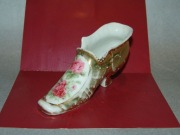 Porcelanowy bucik ze złoceniami