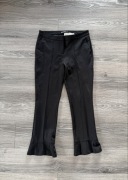 eleganckie spodnie z falbaną na dole i kantem Cambio rozmiar 38 Długość 7/8