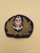 Godło z czapki oficerskiej Polskiej Marynarki Handlowej z okresu PRL.