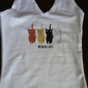 koszulka z kotami "we are all cats"