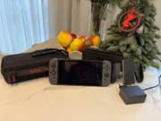 Nintendo Switch V2 - zestaw: dock, ładowarka, case, uchwyt, paski