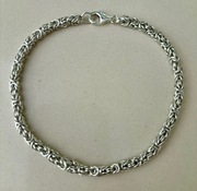Srebrna bransoletka o splocie królewskim 25 cm, 20 g.