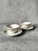 Dwie filiżanki ze spodkami porcelana Chodzież 