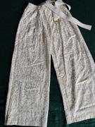 spodnie białe typu szwedy livans