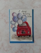 Kartka na rocznicę ślubu z ręcznie malowanym autkiem i z napisem.