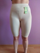 Legginsy w kolorze beżowym. L/XL