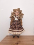 Porcelanowa lalka wys 40cm blondynka z lokami