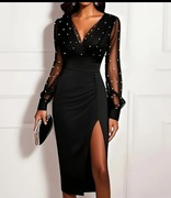 Elegancka czarna sukienka koktailowa z tiulowymi rekawami 