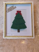 Choinka w ramce za szybką 