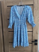 Sukienka rozkloszowana z gumką pod biustem 40 kwiaty 