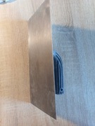 Paca nierdzewna uchwyt plastikowy 270 mm gładka (81)