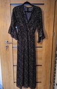 Czarna elegancka sukienka maxi w złote groszki