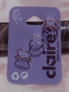 Zestaw nausznic, kolczyków marki Claire's