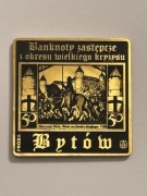 Bytów. Klipa kolekcjonerska mosiądz 35X35 mm. Gyges