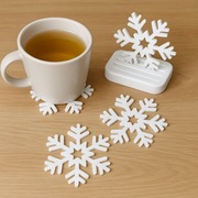 Zestaw 4 podkładek pod kubek śnieżynki 10,5 cm