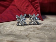 Świąteczne srebrne kolczyki gwiazdki z 2x 0,5ct Moissanitem pozłacane