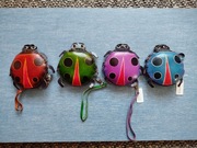 Skórzane portfele / etui w kształcie biedronek