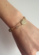 Christian Dior złota bransoletka z ozdobnym sercem