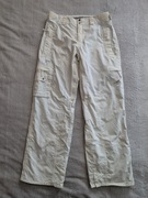 Kremowe spodnie narciarskie haftowane w kwiatki Helly Hansen Tech M 38