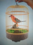 Przepiękny ptaszek zabawka w klatce,śpiewający, 