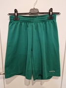 Spodenki piłkarskie krótkie sportowe KIPSTA zielone 141-150 cm 10-11 lat
