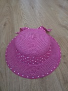 Kapelusz słomkowy z rondem różowy z kokardą w groszki rozmiar 54