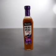 Nando's Garlic Peri-Peri Sauce 500g – Kultowy Smak Czosnku i Pikanterii!
