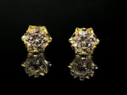 Świąteczne srebrne kolczyki gwiazdki z 2x 1ct Moissanitem pozłacane