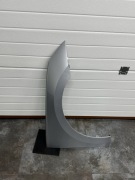 Skoda octavia IV blotnik przód prawy LA7W igła 