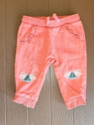 35. Koralowe spodnie dresowe ćmy rozmiar 74