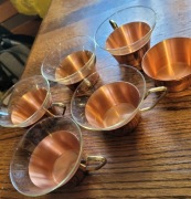 Pięc starych filiżanek z miedzi szklane koszyki Schott&Gen Jena Glas