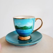 Filiżanka ze spodkiem ręcznie malowana