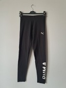Puma czarne legginsy 164 ze srebrnym napisem