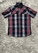 Kolorowa koszula Nike.