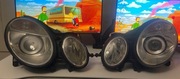 Lampy Przód Mercedes W211 HELLA Xenon Skrętne - Komplet