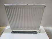 Nowe deweloperskie grzejniki pokojowe płytowe dolne białe    