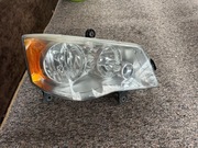 Oryginalny prawy reflektor lampa prawa Chrysler Town and Country 2010