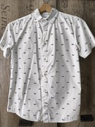 Biała koszula 152 w rowerki