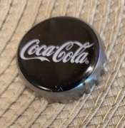 Kapsel Coca Cola butelkowane